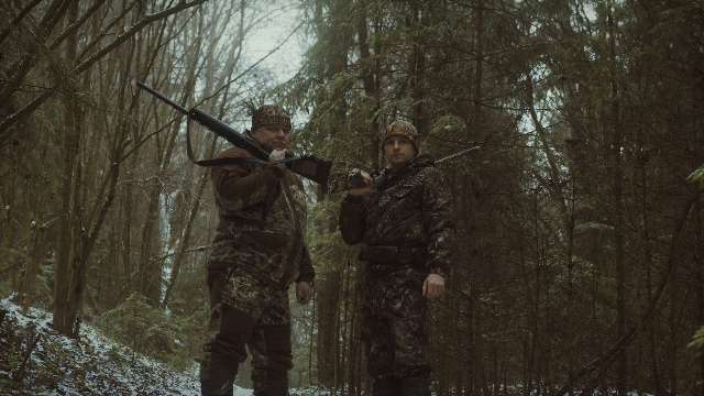 Two soldiers in a forest